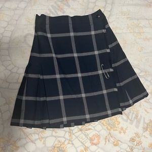 High school kilt. Only wore a couple of times. Size is adjustable